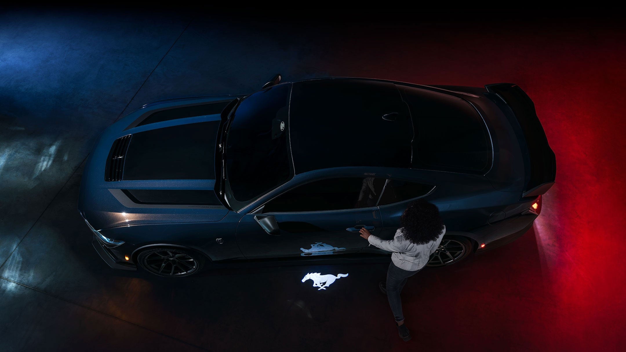 2024 Ford Mustang® Dark Horse™ model with a driver approaching the vehicle | Joe Hall Ford in Lewiston ID