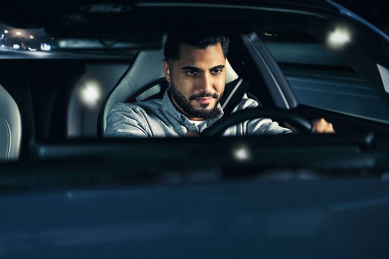 Person sitting in the driver’s seat of a parked 2024 Ford Mustang® coupe | Joe Hall Ford in Lewiston ID